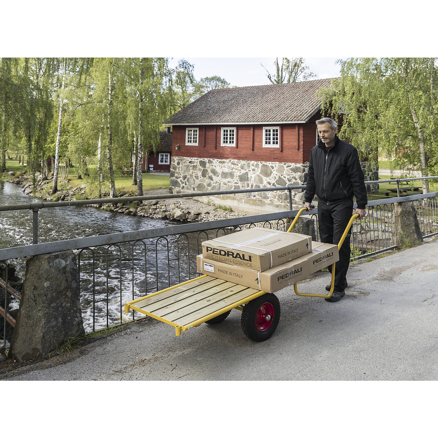 Balanced general purpose barrow, platform 1650 x 615 mm, with pneumatic tyres.