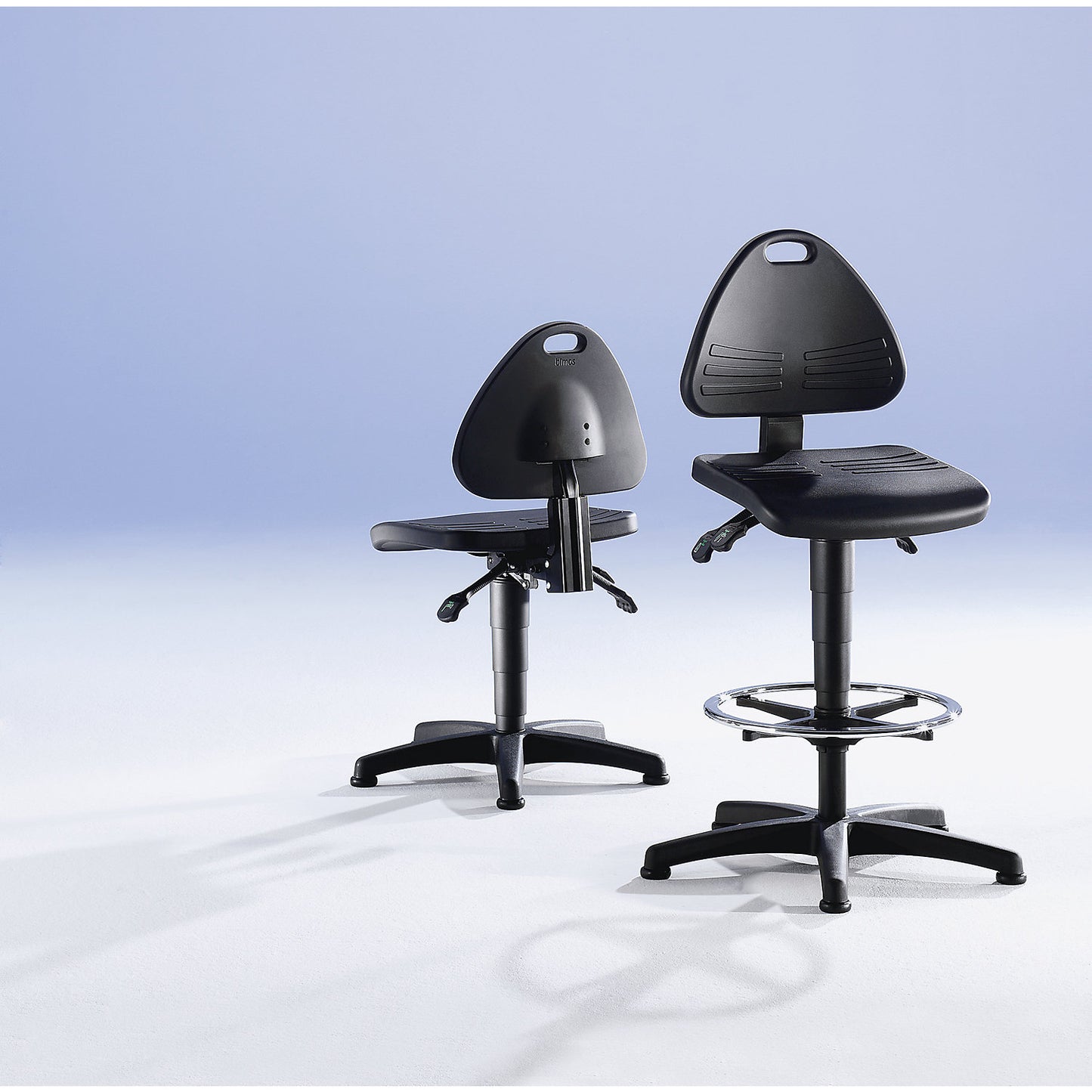 Industrial swivel chair, PU foam upholstery, with floor glides, height adjustment range 430 - 600 mm.