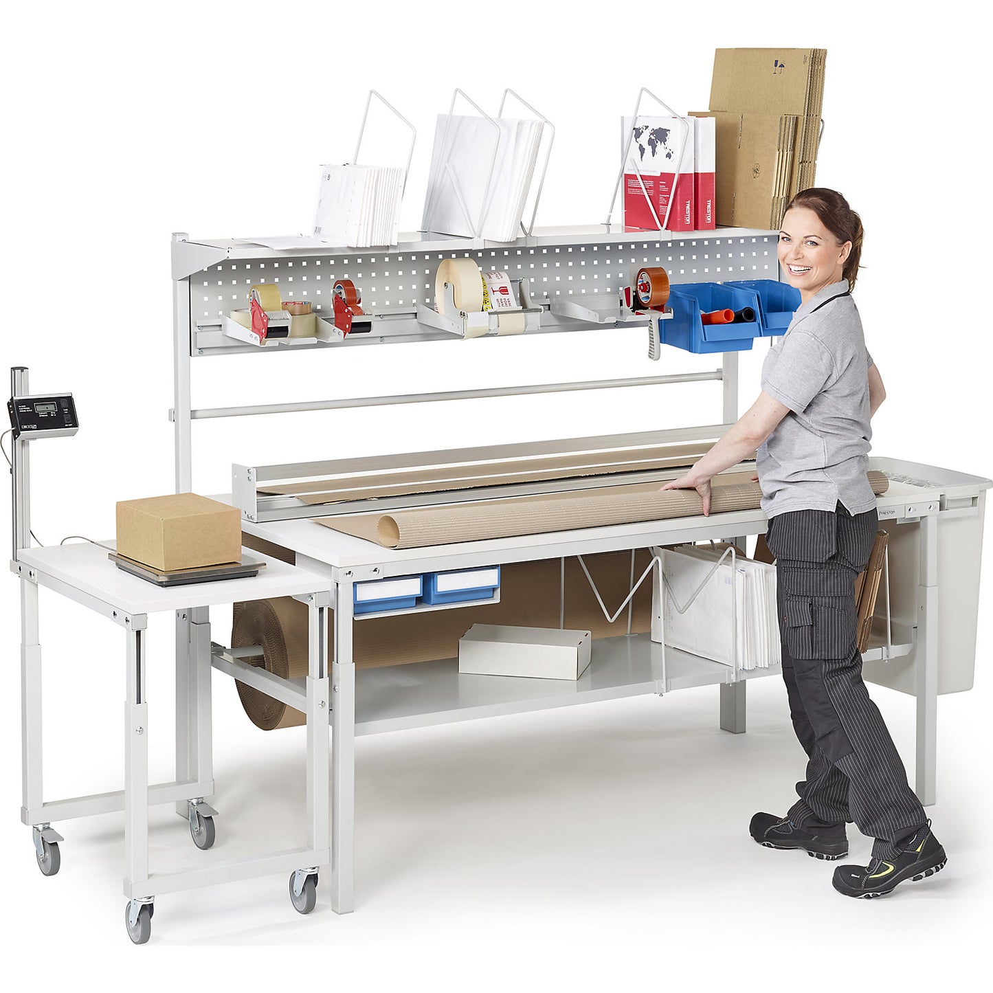 Complete packing table, manually height adjustable, with cardboard packaging shelf, document tray, perforated panel and roll holders, HxWxD 1080 - 1550 x 1800 x 900 mm.