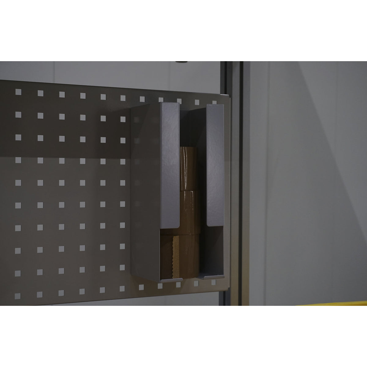 Adhesive tape magazine, for quick removal, hole centre distance 76 mm.