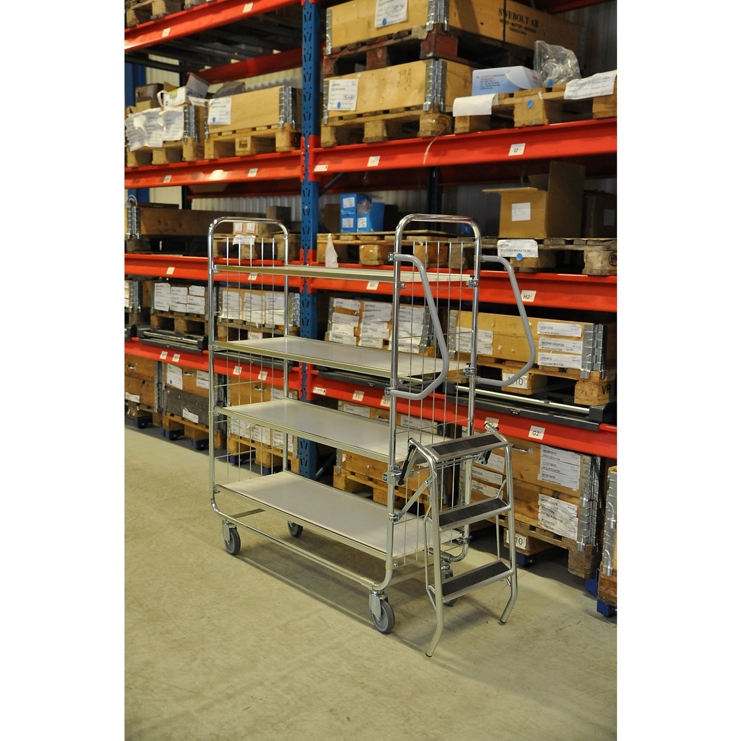 Zinc plated shelf truck, 4 shelves, LxWxH 1195 x 470 x 1590 mm, 4 castors, 2 with wheel stops.