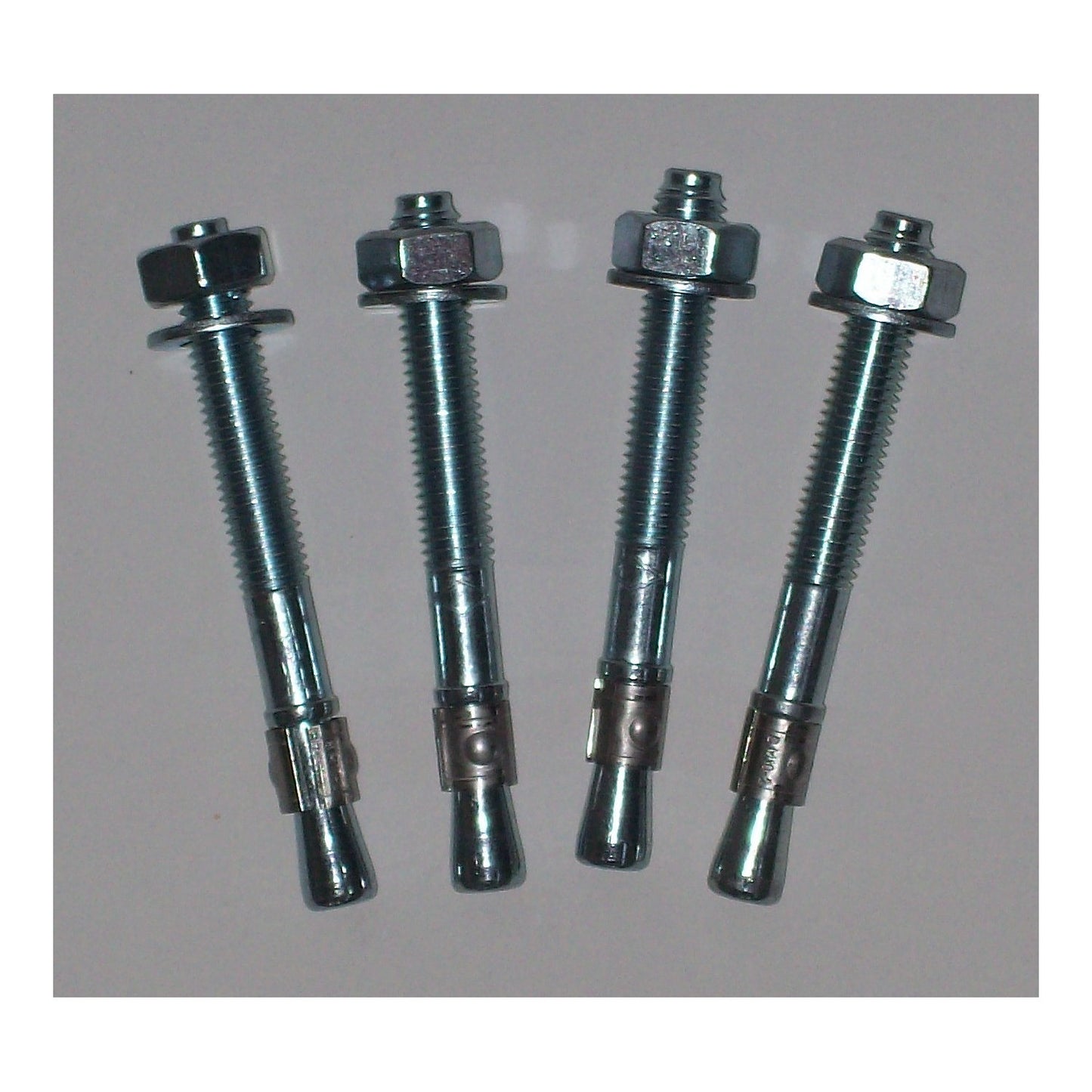 Mounting kit for crash protection bollard, 4 bolts incl. special plugs, zinc plated.