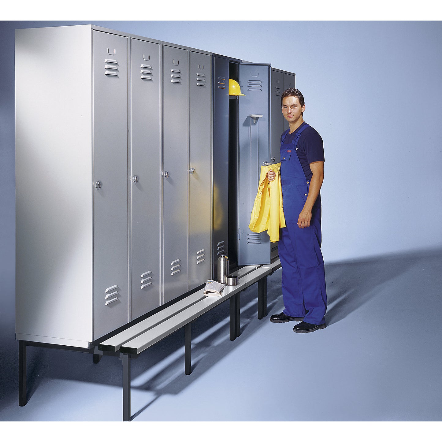 Berlin 2 clothes locker with bench seat, 2 compartments, light grey/blue grey, W 600 mm, base frame, plastic, sloping roof.