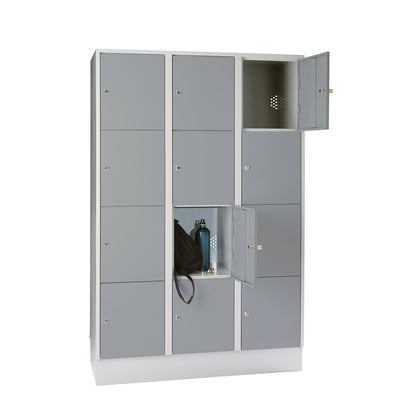 Munich 4-fold compartment locker, 3 compartments, light grey / silver grey, W 1200 mm, with base plinth.