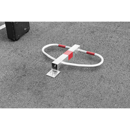 Parking barrier, tilting, individual key, for setting in concrete.