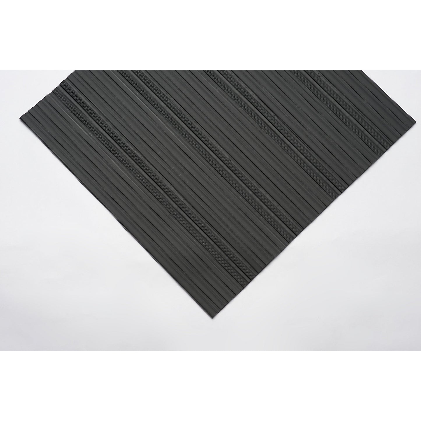 Soft PVC runner, with closed surface, sold by the metre, black, width 600 mm.