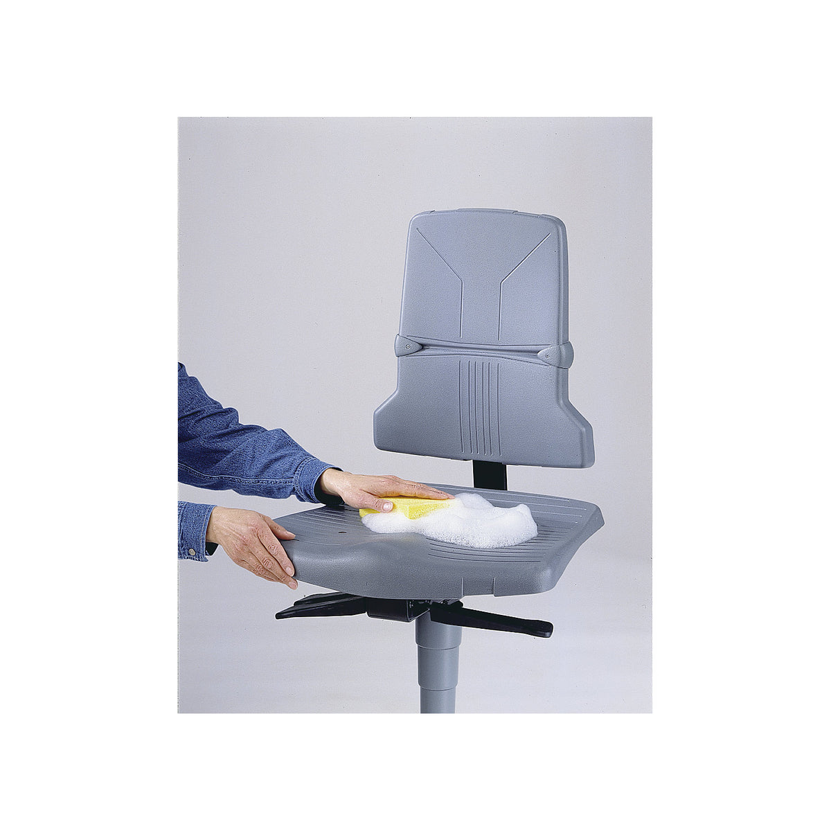 SINTEC industrial swivel chair, permanent contact mechanism, five-foot tubular steel base with glides and step.