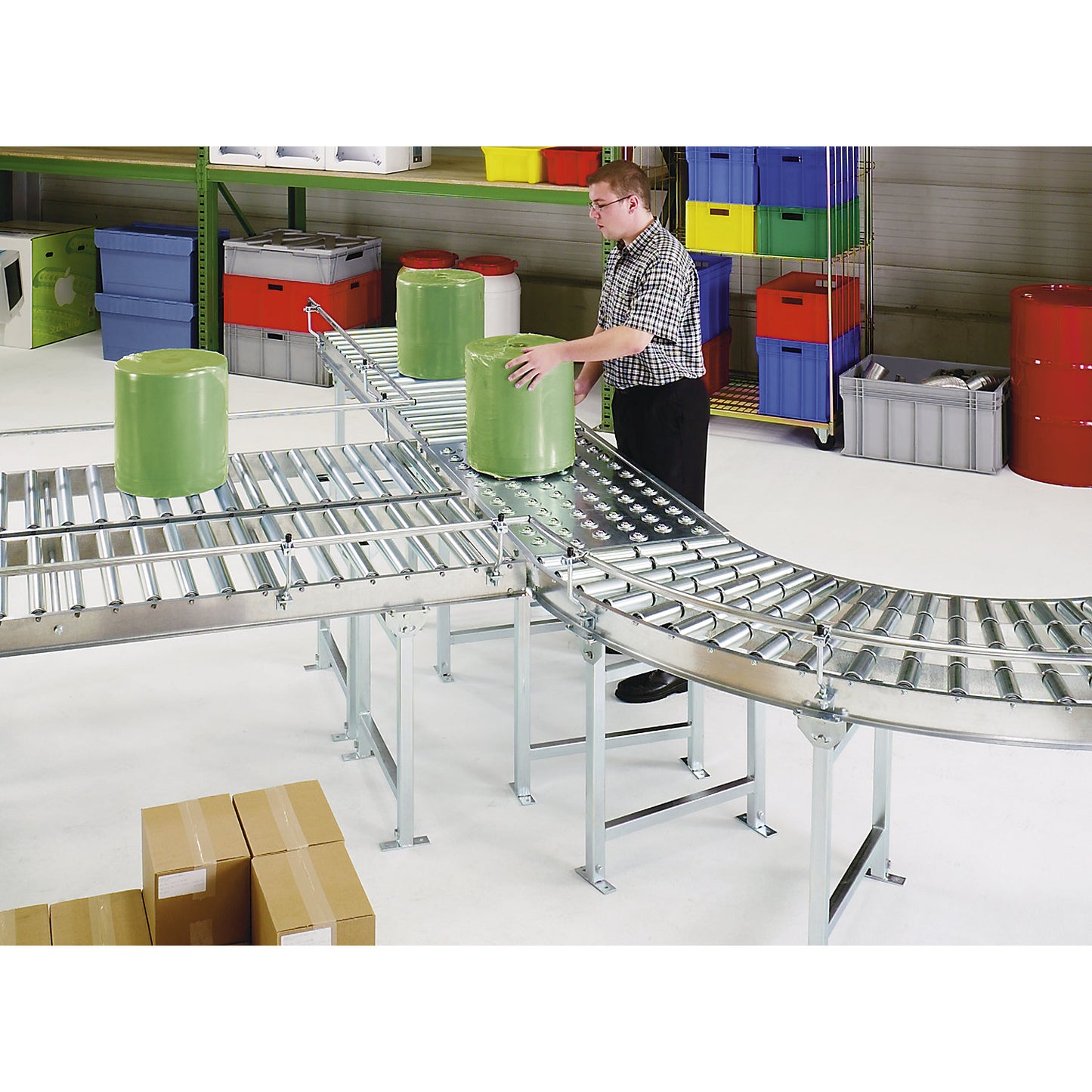 Roller conveyor, steel frame with zinc plated steel rollers, track width 900 mm, distance between axles 100 mm, length 1 m.