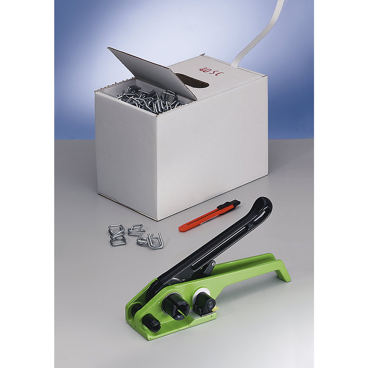 Strapping set, bonded reinforced PET strapping, tensioning tool, strapping in dispenser box, metal buckles, packing knife, strap width 16 mm.