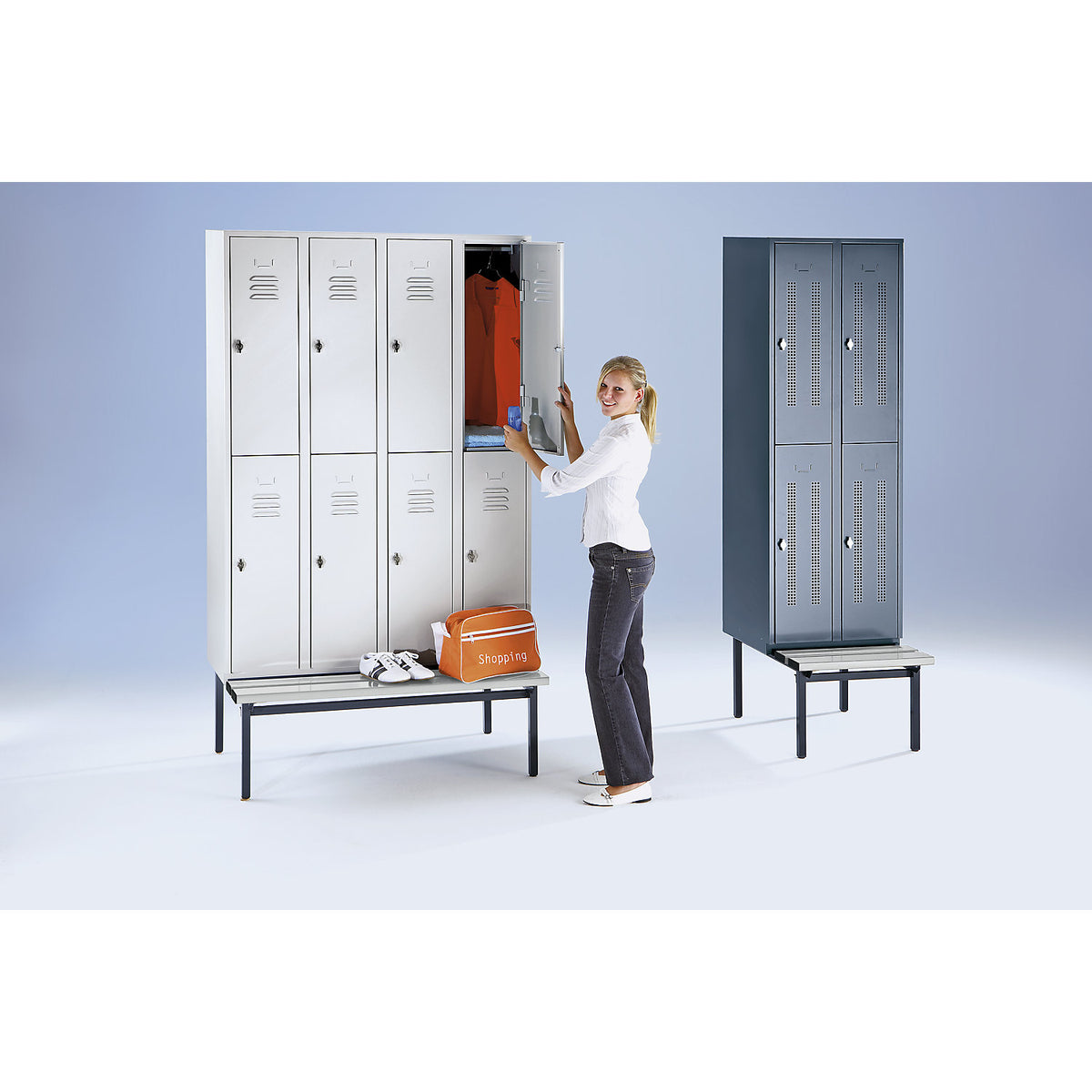 Berlin 2 double deck clothes locker with bench seat, 2 sections, light grey/light blue, width 600 mm.