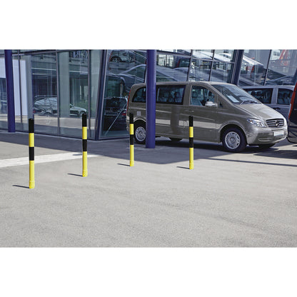 Barrier post made of steel tubing, flexible, Ø 76 mm, for setting in concrete, black / yellow.