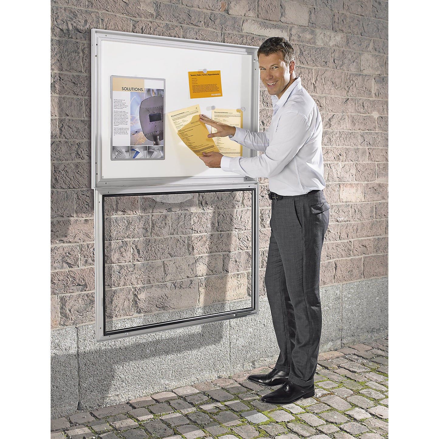 Display case for indoor and outdoor use, door opens downwards 180°, for A0, rear panel pure white RAL 9010.