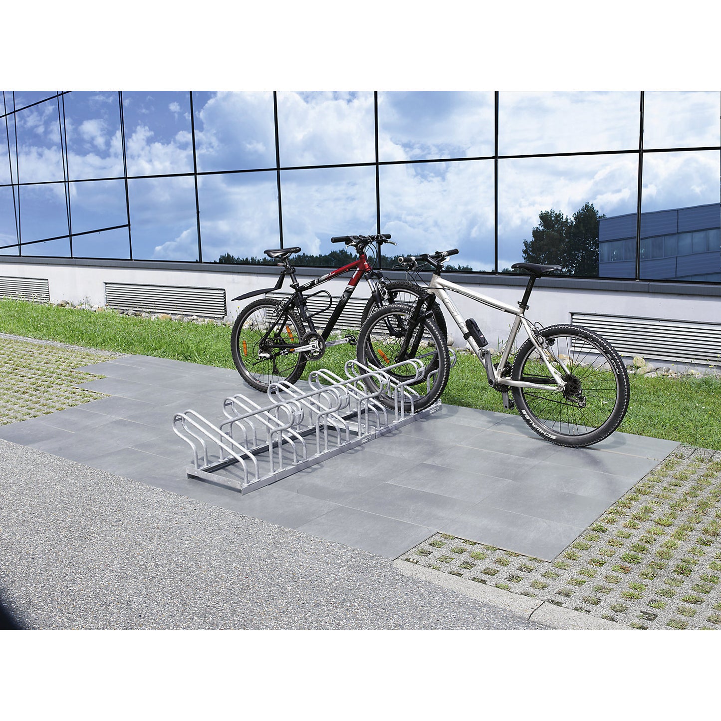 Bicycle rack, bars made of 18 mm steel tubing, double sided rack, hot-dip galvanised, 12 parking spaces.