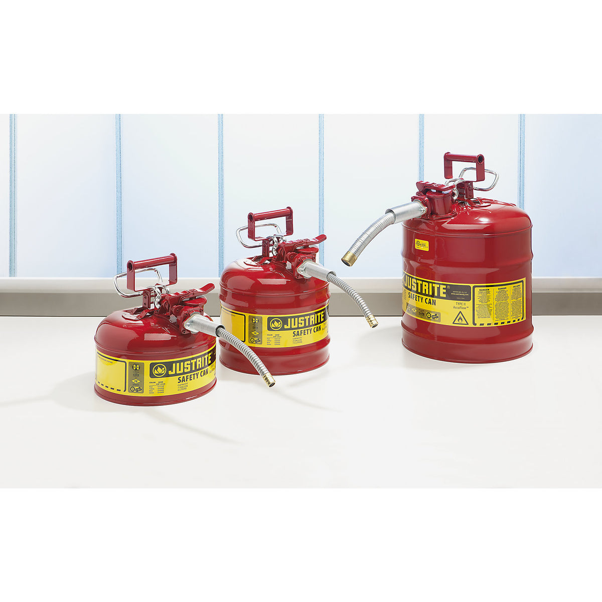 Safety container with flexible metal spout, capacity 4 l, zinc plated and painted.