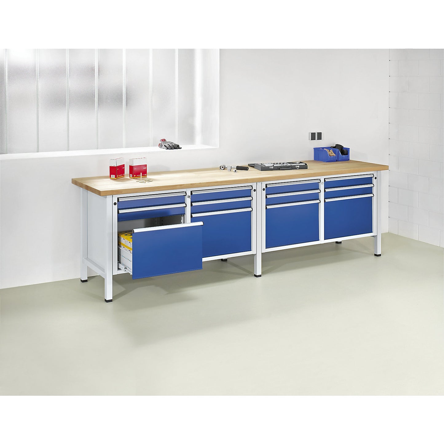 Workbench width 2800 mm, frame construction, 12 drawers, 8 x 90 mm, 4 x 360 mm, height 890 mm, sheet steel covered worktop.