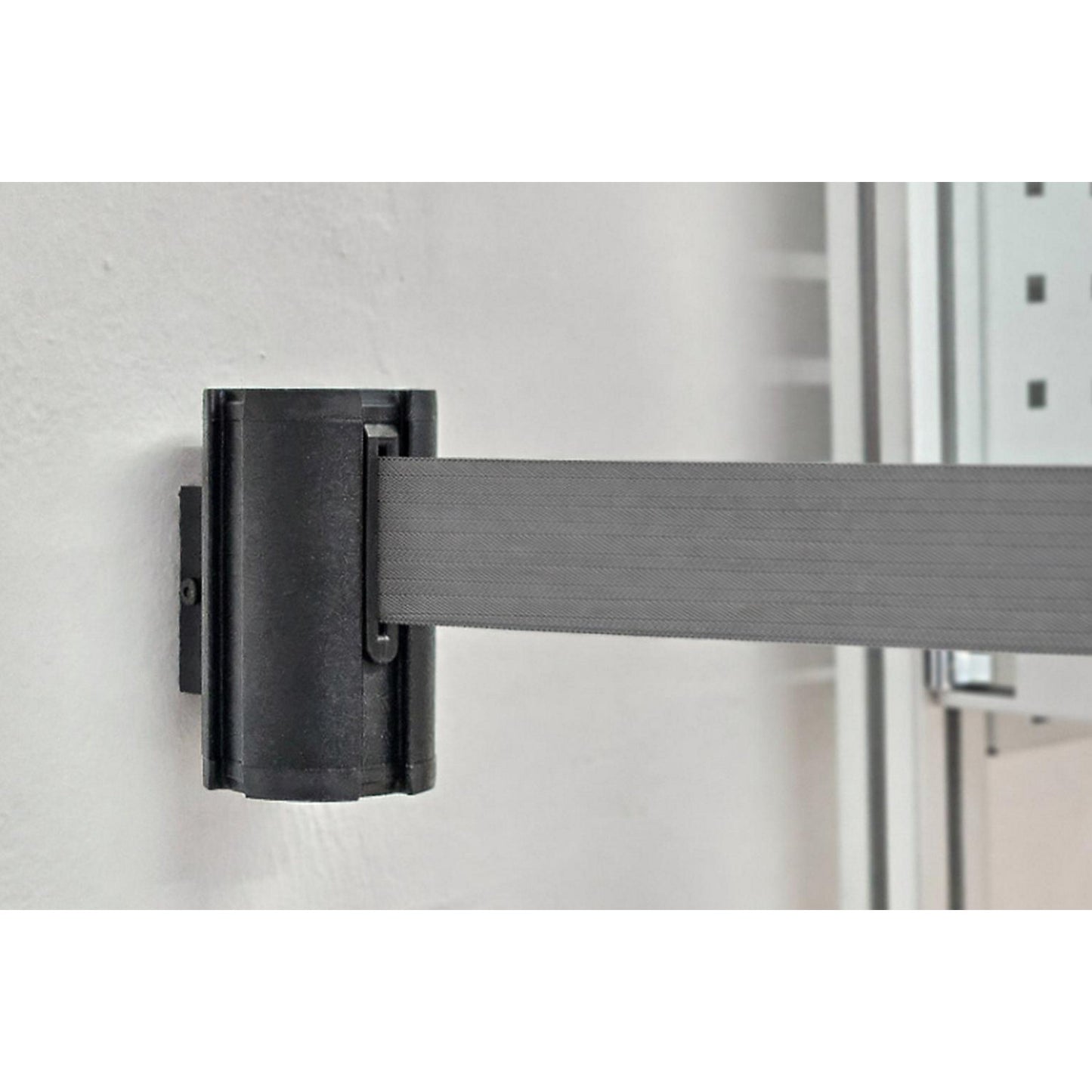 Wall Mount tape belt cartridge, belt extends to max. 3700 mm, belt colour silver grey.