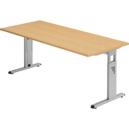 Desk with C-foot frame, height adjustable 680 - 760 mm, depth 800 mm, width 1800 mm, beech finish.