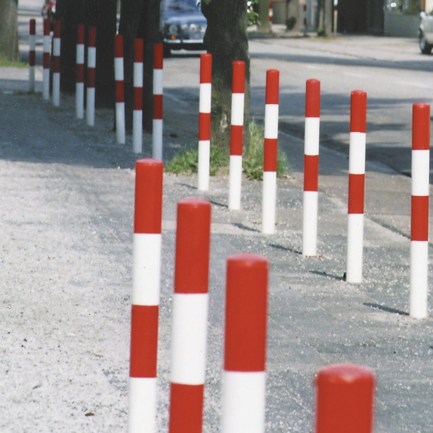 Bollard Morion, for setting in concrete, Ø 90 mm, hot dip galvanised / reflective red, 2 eyelets.