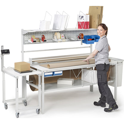 Complete packing table, manually height adjustable, with cardboard packaging shelf, document tray, perforated panel and roll holders, HxWxD 1080 - 1550 x 1800 x 900 mm.
