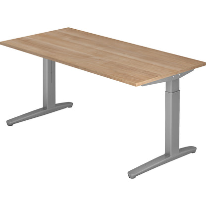 ANNY - Desk with C-foot frame, height adjustable 650 - 850 mm, width 1600 mm, walnut finish / white aluminium.