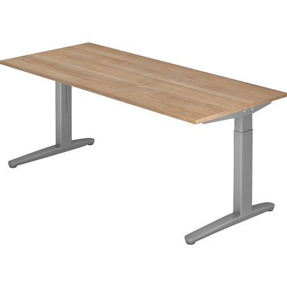 ANNY - Desk with C-foot frame, height adjustable 650 - 850 mm, width 1800 mm, walnut finish / white aluminium.
