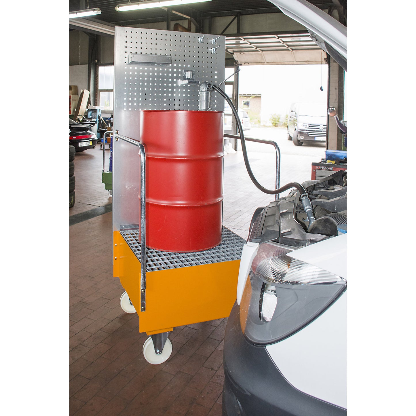 Mobile sump tray with perforated panel, 1 x 60 l drum placed upright, LxWxH 570 x 590 x 1775 mm, yellow orange.