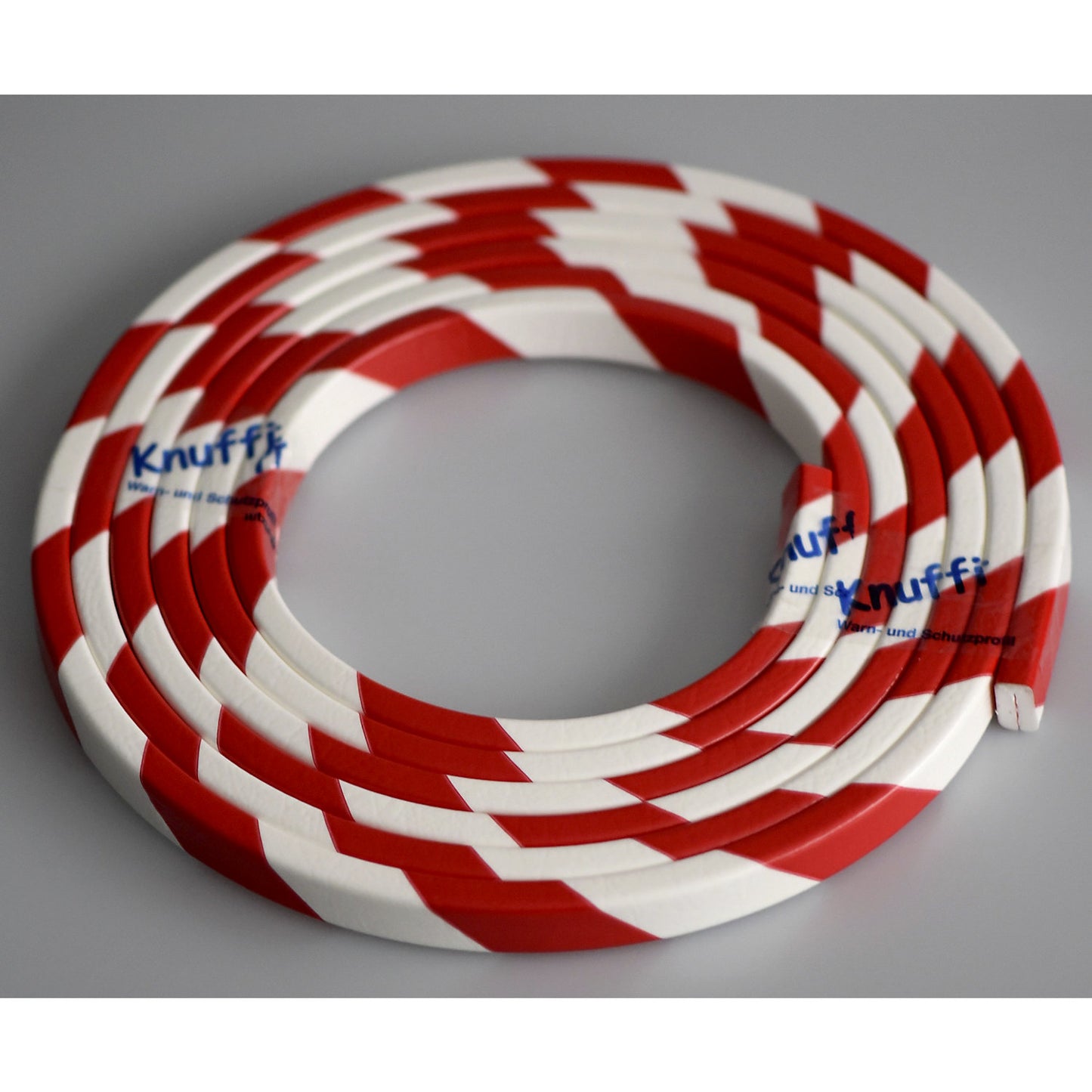 Knuffi® corner protection, type W, 1 x 5 m roll, red / white.