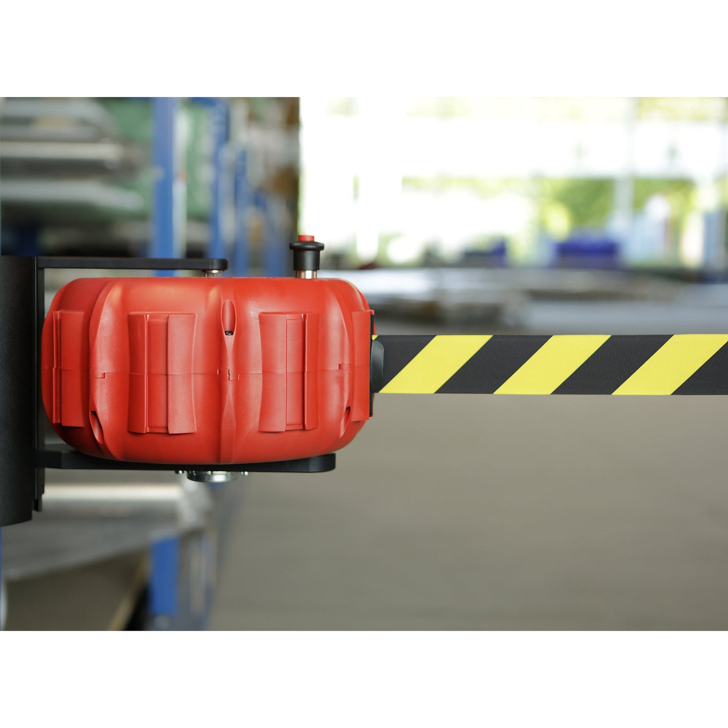 JetTrac wall mounted belt barrier, extension length max. 25000 mm, black on yellow.