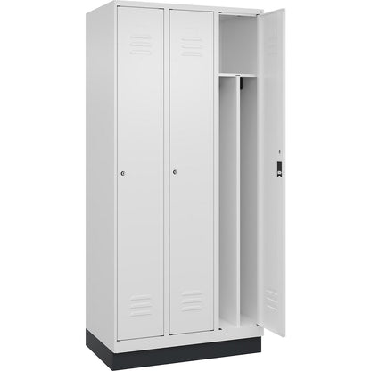Classic PLUS clean and dirty clothes locker, narrow, 3 compartments, shortened centre divider, traffic white, W 900 mm, with base plinth, cylinder lock, centre partition.