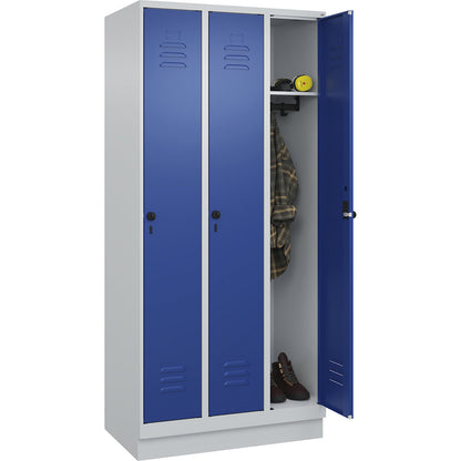 Classic PLUS clothes locker, 3 compartments, light grey/gentian blue, W 900 mm, with base plinth, rotary bolt.