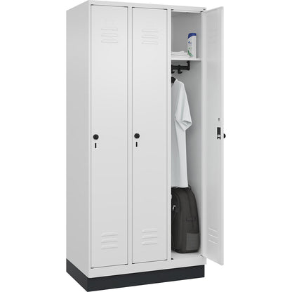 Classic PLUS clothes locker, 3 compartments, traffic white, W 900 mm, with base plinth, rotary bolt.