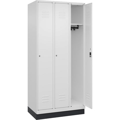 Classic PLUS clothes locker, 3 compartments, traffic white, W 900 mm, with base plinth, cylinder lock.