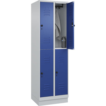 Classic PLUS double deck clothes locker, 2 compartments, light grey/gentian blue, HxW 1950 x 600 mm, with base plinth, rotary bolt.