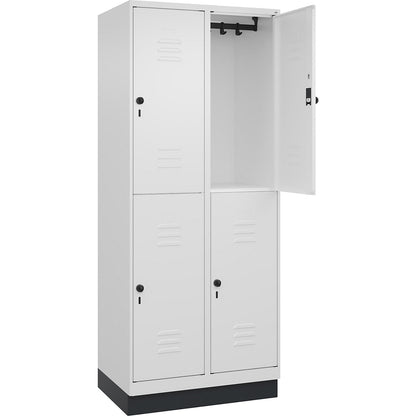 Classic PLUS double deck clothes locker, 2 compartments, traffic white, HxW 1950 x 800 mm, with base plinth, rotary bolt.