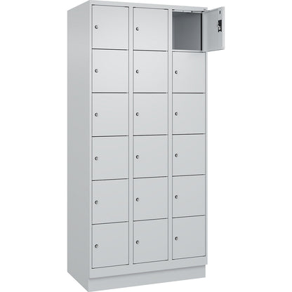Evolo PLUS 6-fold compartment locker, 3 compartments, light grey, W 900 mm, 18 compartments, with base plinth, cylinder lock.