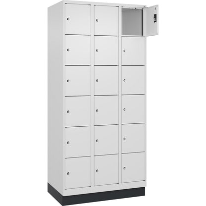 Evolo PLUS 6-fold compartment locker, 3 compartments, white, W 900 mm, 18 compartments, with base plinth, cylinder lock.