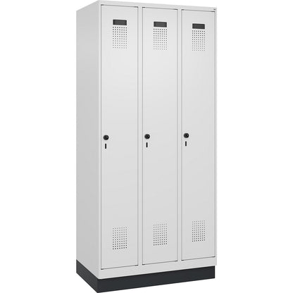 Evolo PLUS locker, 3 compartments, traffic white, W 900 mm, with base plinth, rotary bolt.