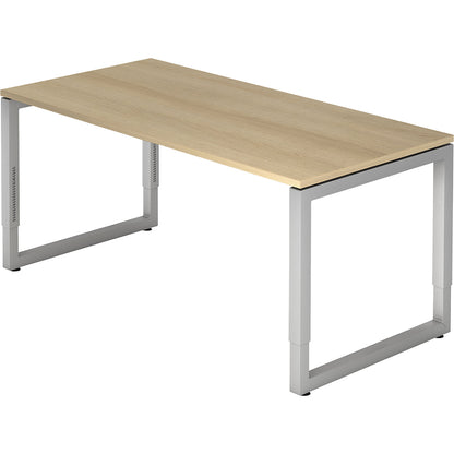 Desk with frame made of rectangular tubular steel, height 650 - 850 mm, WxD 1600 x 800 mm, oak / aluminium silver.