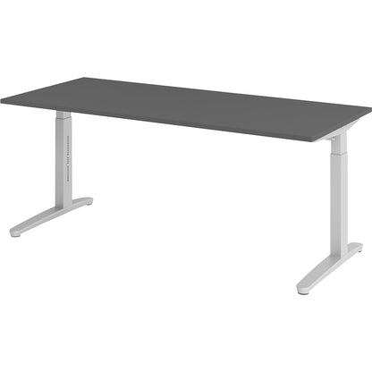 ANNY - Desk with C-foot frame, height adjustable 650 - 850 mm, width 1800 mm, graphite / aluminium silver.