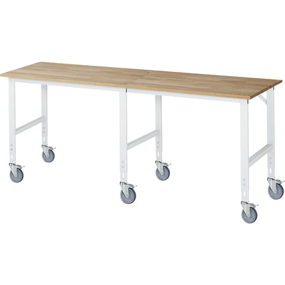 Work table, mobile, solid beech wood panel, thickness 25 mm, 60 x 30 mm, WxDxH 2500 x 800 x 910 - 1230 mm.