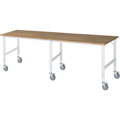 Work table, mobile, solid beech wood panel, thickness 25 mm, 60 x 30 mm, WxDxH 3000 x 1000 x 910 - 1230 mm.
