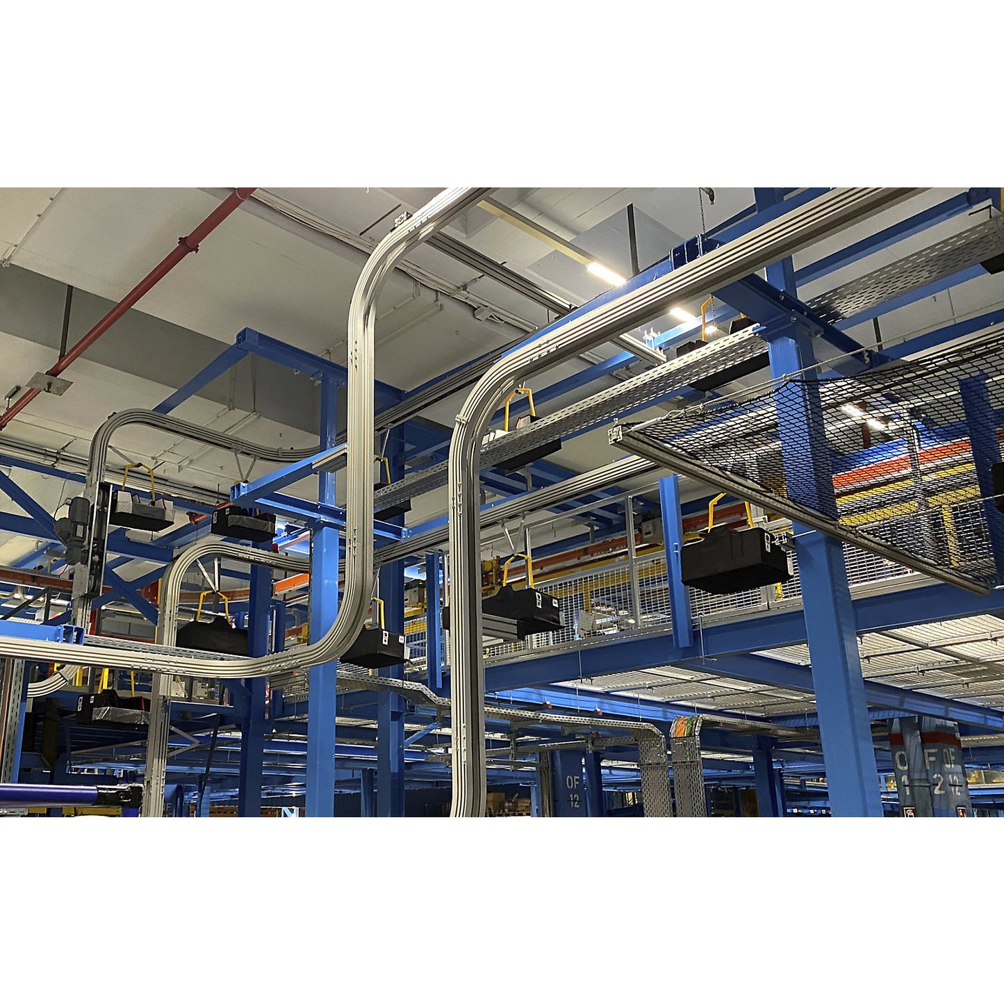 Curved overhead conveyor segment, horizontal profile opening, inner curve radius 500 mm, 90°.