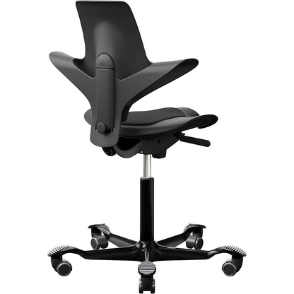 HÅG Capisco Puls 8010 office chair, upholstered backrest, black.