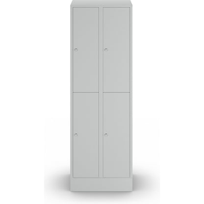 München double deck clothes locker, 2 compartments, W 600 mm, light grey, with base plinth.